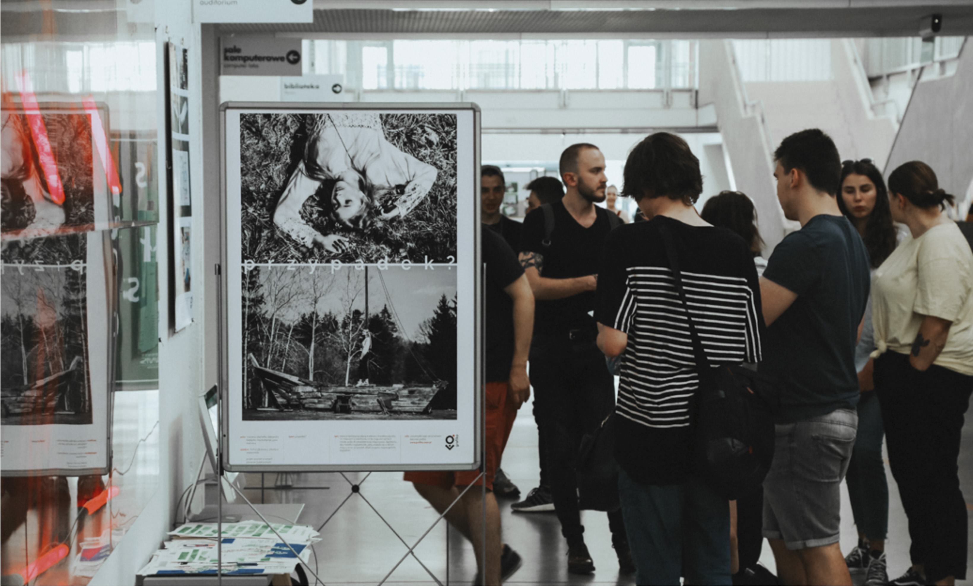 People viewing student posters during Main Event